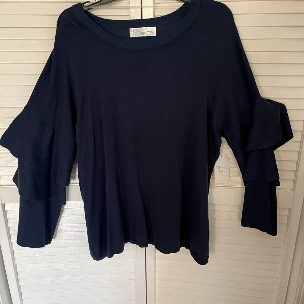 Navy sweater with fun ruffled sleeves